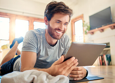 Buy stock photo Smile, man and fitness with tablet at house for research, online tutorial and training progress. Happy, male person and tech for exercise, watching video and workout instructions for wellness in home