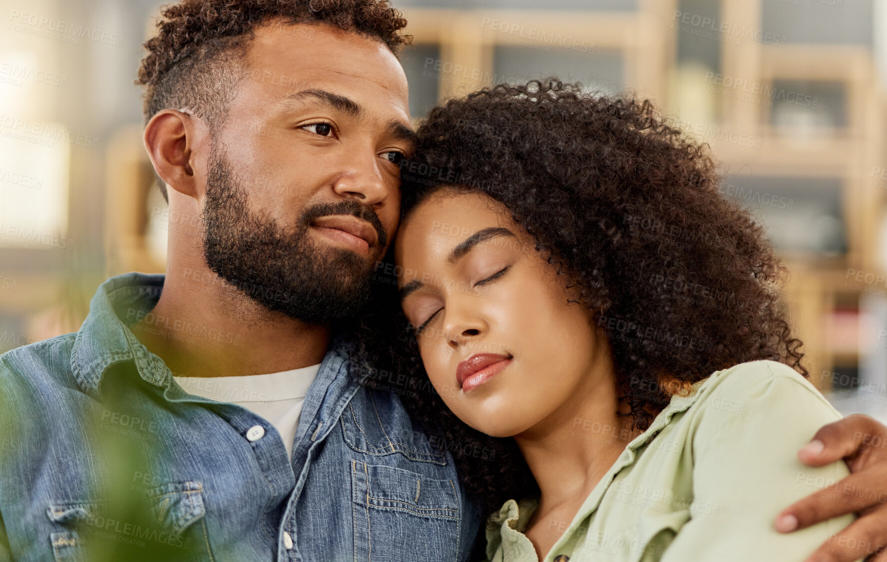 Buy stock photo Couple, relax and embrace with love at house for affection, partner support and comfortable. Thinking, African people and rest with eyes closed, calm morning and stress free for weekend break in home