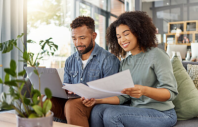 Buy stock photo Document, laptop and couple on sofa in home for finance, bonus or investment together. Happiness, reading or man and woman with paperwork for salary increase, growth or review of savings account