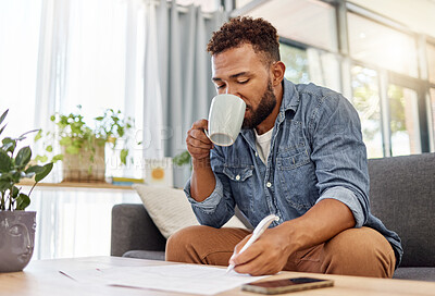 Buy stock photo Man, coffee and writing on document at house for finance, review budget and bills invoice. African person, paperwork and application for home insurance, mortgage expenses and reminder for payment 