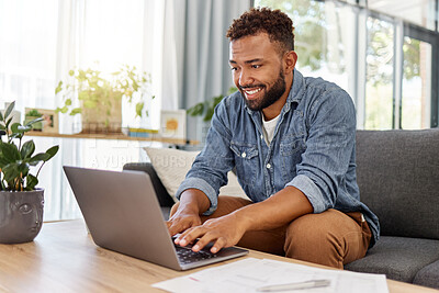 Buy stock photo Happy, laptop and man on sofa in home for remote work, investment deal or opportunity. Happiness, typing and freelancer or person on computer for business growth, planning or online research