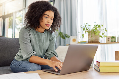 Buy stock photo Woman, typing and sofa with laptop at house for research, finance report and review expenses. African person, pc and audit with documents, financial information and online payment of household bills
