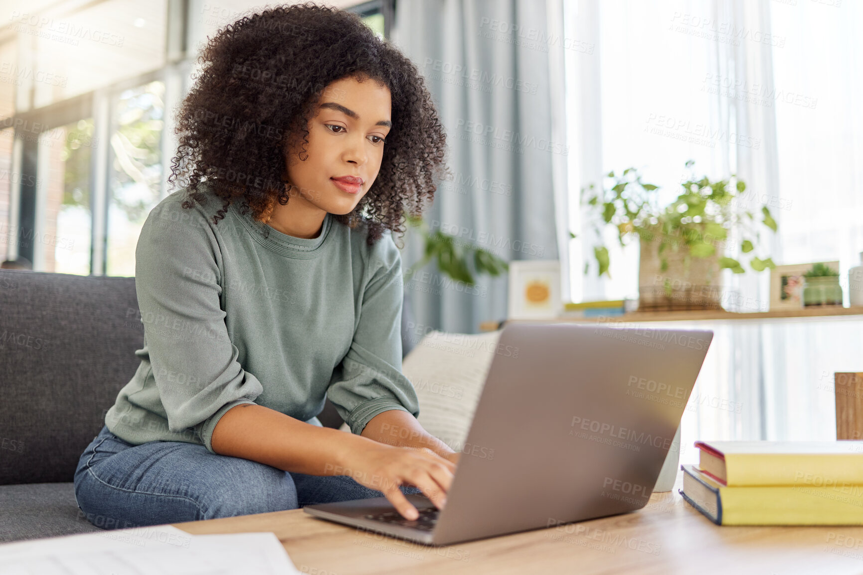 Buy stock photo Woman, typing and sofa with laptop at house for research, finance report and review expenses. African person, pc and audit with documents, financial information and online payment of household bills