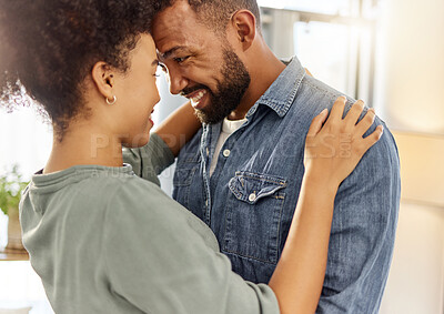 Buy stock photo Love, smile and couple in home for bonding, support and commitment with weekend. House, morning and man with woman for connection, relationship and anniversary for romance or embrace together