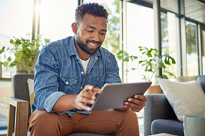 Buy stock photo Smile, man and remote work with tablet at house for research, proofreading and review grammar. Happy, male person and digital for editing article, fact checking and freelancer with copywriting report