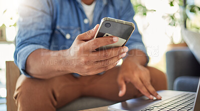 Buy stock photo Hand, phone and man with laptop in home office for social media, talent agent or communication. Freelancer, influencer marketing and person with tech for message, networking or ad campaign on web