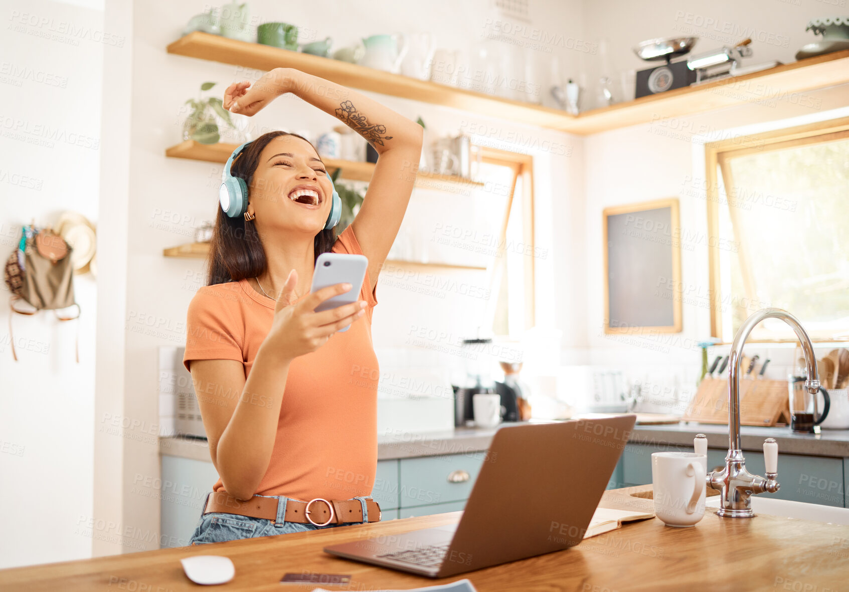 Buy stock photo Woman, dancing and headphones with phone in kitchen for music, break and entertainment with happiness. Song, radio and female person with cellphone, audio tech and singing with subscription in home