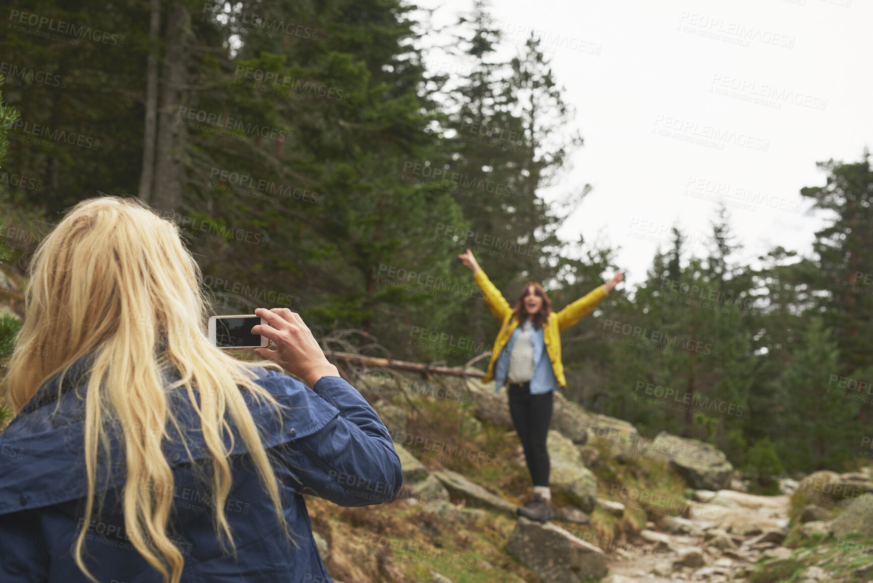 Buy stock photo Mountain, hiking and friends with photo in nature for adventure, travel and memory for holiday. Happy, phone and women with picture for social media, post and moment for tourism, explore and outdoor