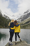 Adventure woman enjoying view of majestic mountain lake explore travel discover beautiful earth
