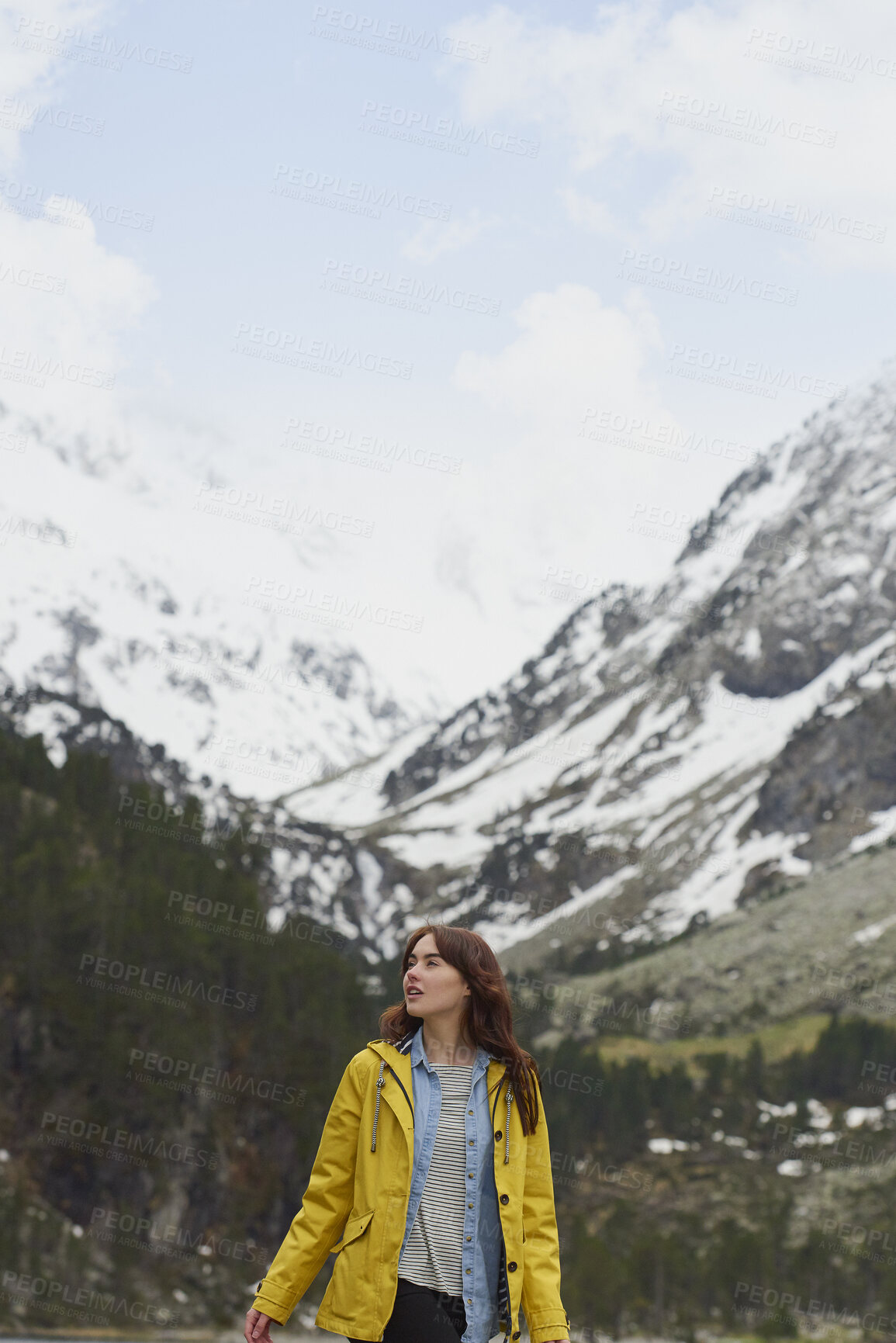 Buy stock photo Winter, woman and hiking in nature with mountain, snow or sightseeing exploration for outdoor adventure. Space, female person and peace in forest with scenic view, cold climate or travel for vacation