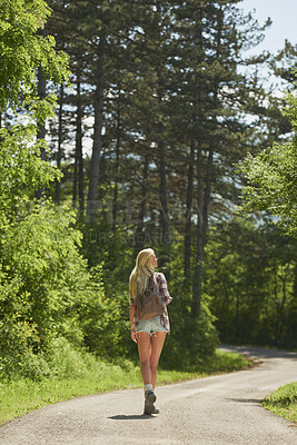 Buy stock photo Thinking, calm or woman in nature with sightseeing, trip mindset or mindfulness on summer break. Back, fresh air or person in forest with walk, reflection or peaceful perspective in outdoor getaway.