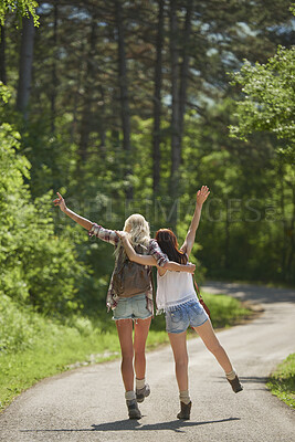 Buy stock photo Travel, hugging or friends in nature with fun, good time and bonding trip on summer break. Back, sunshine or women in forest with walk, vacation connection or playful embrace in outdoor getaway.