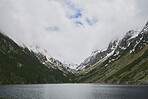 Beautiful mountain lake forest landscape snow forest travel in nature