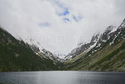 Buy stock photo Mountain, lake and snow landscape with nature for travel, environment or sustainability. Journey, water and clouds in sky for winter season, climate change or exploration for outdoor background