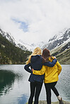 Adventure woman enjoying view of majestic mountain lake explore travel discover beautiful earth