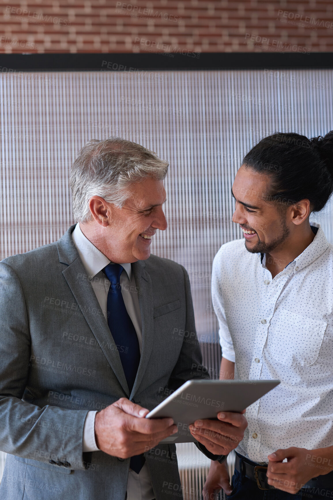 Buy stock photo Laugh, business and manager with man on tablet for investment update, proposal or financial review. Office, discussion and people on tech for online report for finance, budget planning and feedback