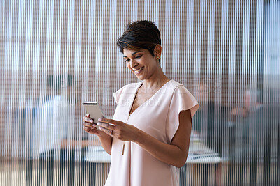 Buy stock photo Business, smile or woman in office with phone, deal close or positive feedback in online chat. Space, happy or mature property agent with tech, listing approval or good news in investment opportunity