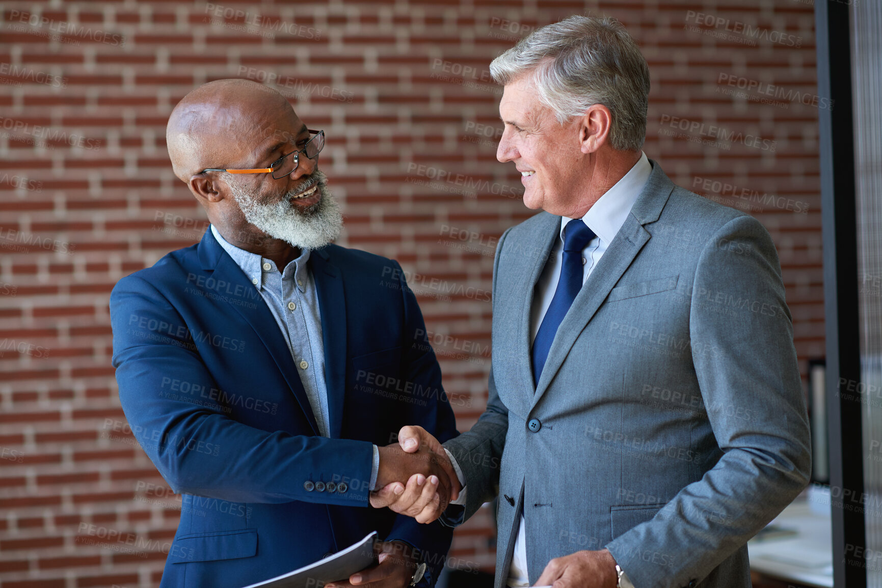 Buy stock photo Office, shaking hands or business men with welcome, introduction or real estate agreement. Mature people, handshake or greeting in workplace for deal, smile or partnership for property investment