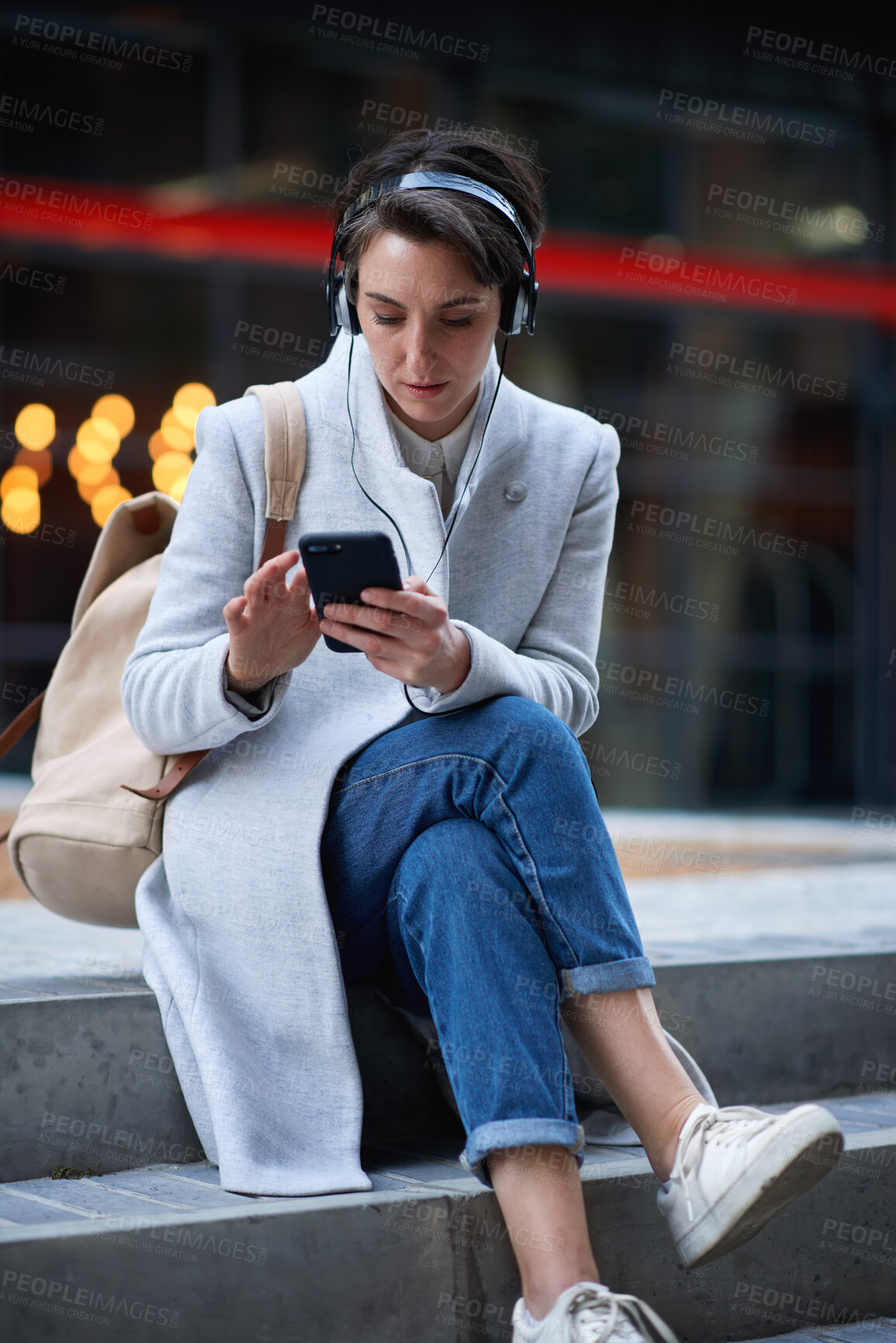 Buy stock photo Outdoor, phone and business woman with headphones, subscription service and browsing internet. Mobile, employee and person in city with music for podcast, audio app and text message with bokeh