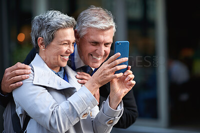 Buy stock photo Business people, city and happy friends with selfie, corporate post or social media update. Mature man, woman and picture of workers outdoor for teamwork, photography memory and smile together