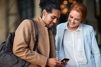 Buy stock photo Reading, friends and business people with mobile in city, watch video and social media post for smile. Connection, happy woman and man with phone for internet meme, blog story and share news in town