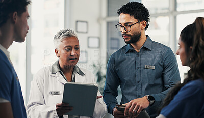 Buy stock photo Medical, meeting or team in hospital with tablet, group insight or patient review for treatment plan. Healthcare, people or doctors with tech, collaboration or director feedback in post surgery.
