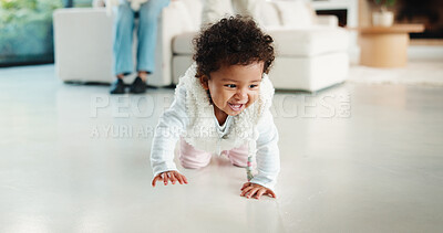 Buy stock photo Baby, cute and crawling on floor in living room of home for development, growth or milestone. Excited, happy and smile of infant girl in modern apartment for childhood, improvement or progress
