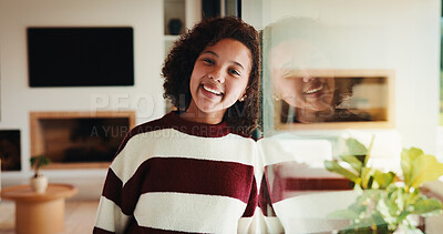 Buy stock photo Portrait, smile and kid by window in family home with good mood, childhood and preteen. Happiness, glass reflection and girl child in living room with positive attitude, relax and break at house