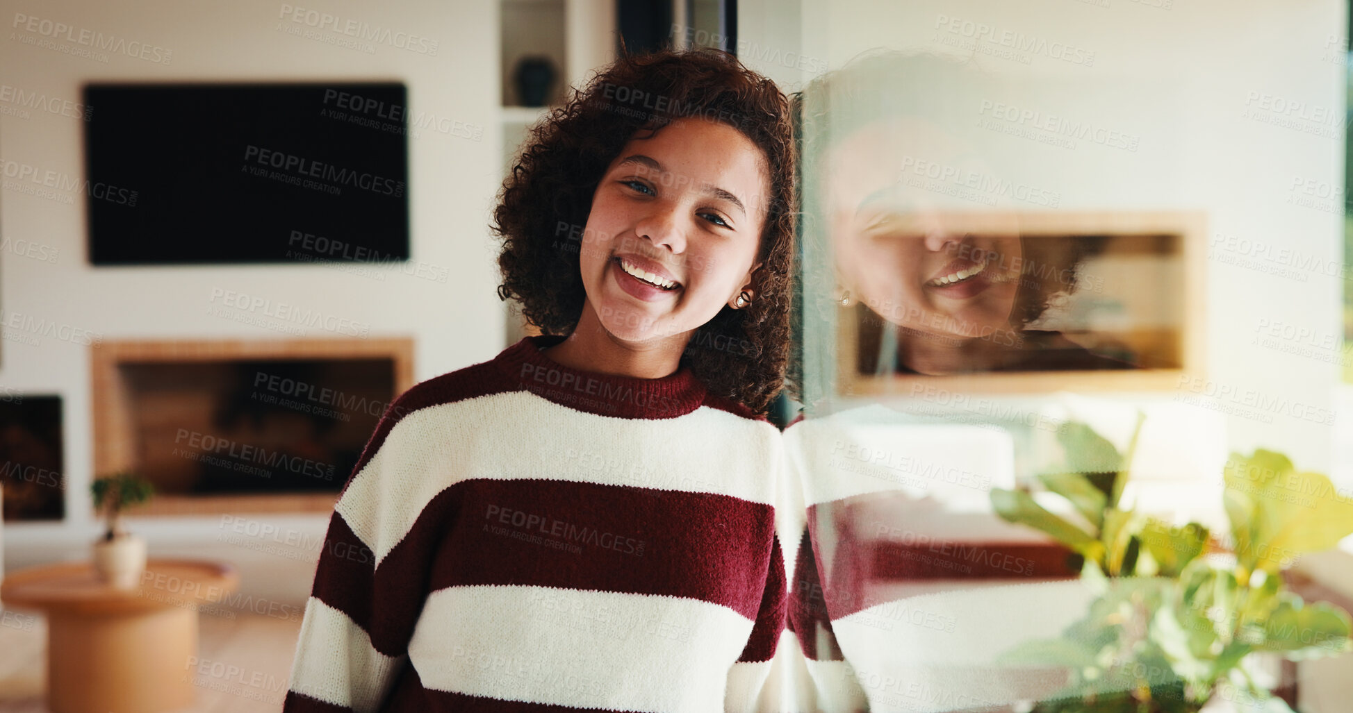 Buy stock photo Portrait, smile and kid by window in family home with good mood, childhood and preteen. Happiness, glass reflection and girl child in living room with positive attitude, relax and break at house