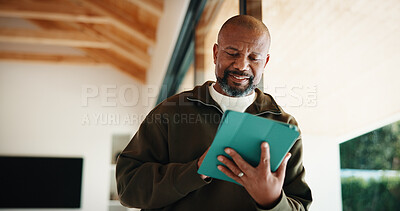 Buy stock photo Tablet, remote work and black man in home for research, ebook publication or story development. Tech, freelance author and mature person by window in house for editing manuscript, planning and smile