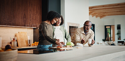 Buy stock photo Parents, daughter and meal prep in kitchen with conversation, help and bonding together for wellness. Happy people, mother and father in home with girl child, healthy food and nutrition for family.