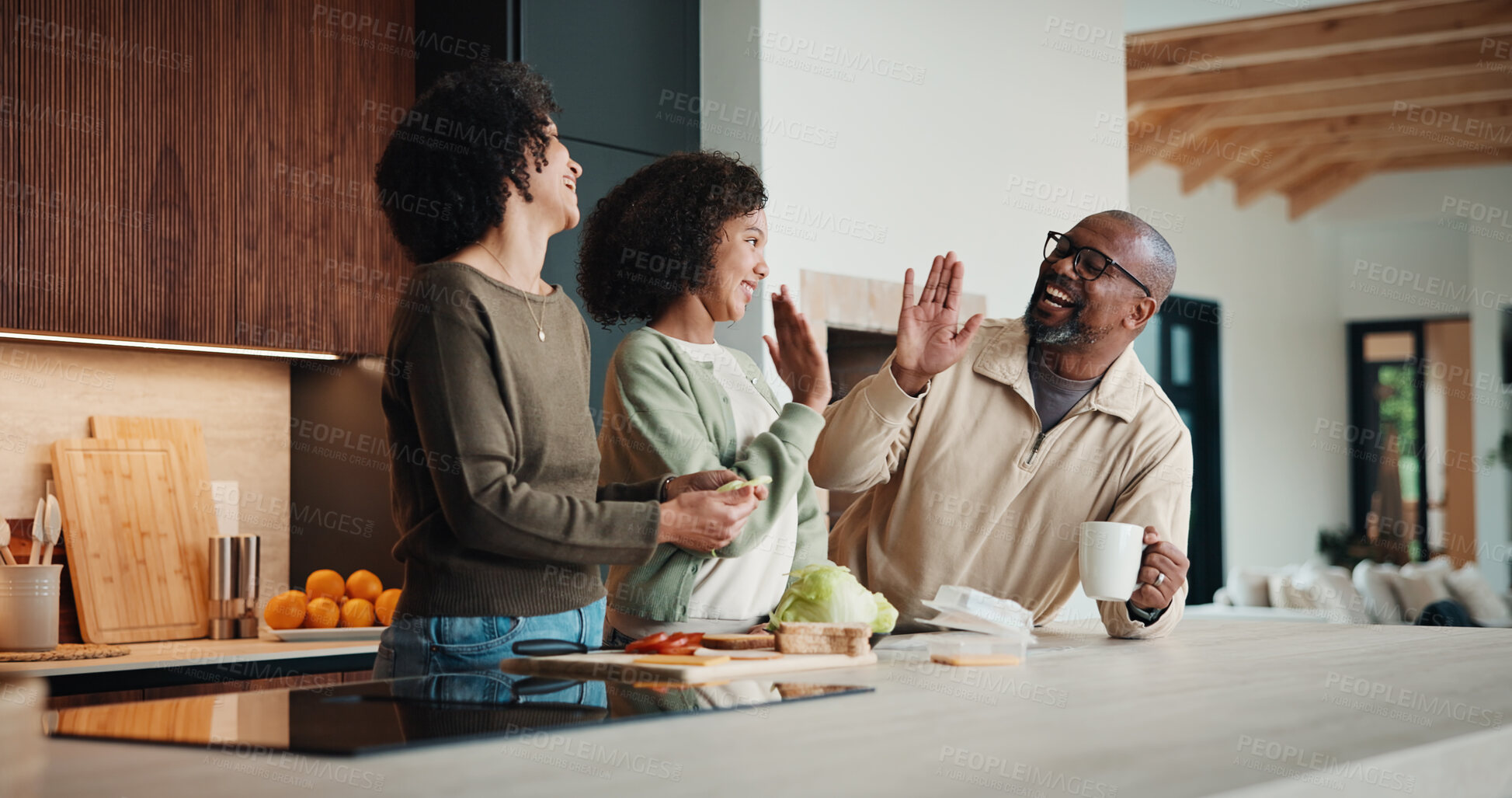Buy stock photo Parents, daughter and high five in kitchen with meal prep, learning or bonding together for wellness. Happy people, mother and father in home with girl child, healthy food and celebration for skills.
