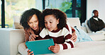 Mom, child or playing with tablet on sofa for entertainment, bonding or online subscription in home. Mother, daughter or kid lying with technology or app for fun game or interaction together in house