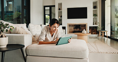 Buy stock photo Streaming, relax and woman on couch with tablet, movie binge and video watching on digital app. Happy, break or mature person with tech, series subscription or search on entertainment platform.
