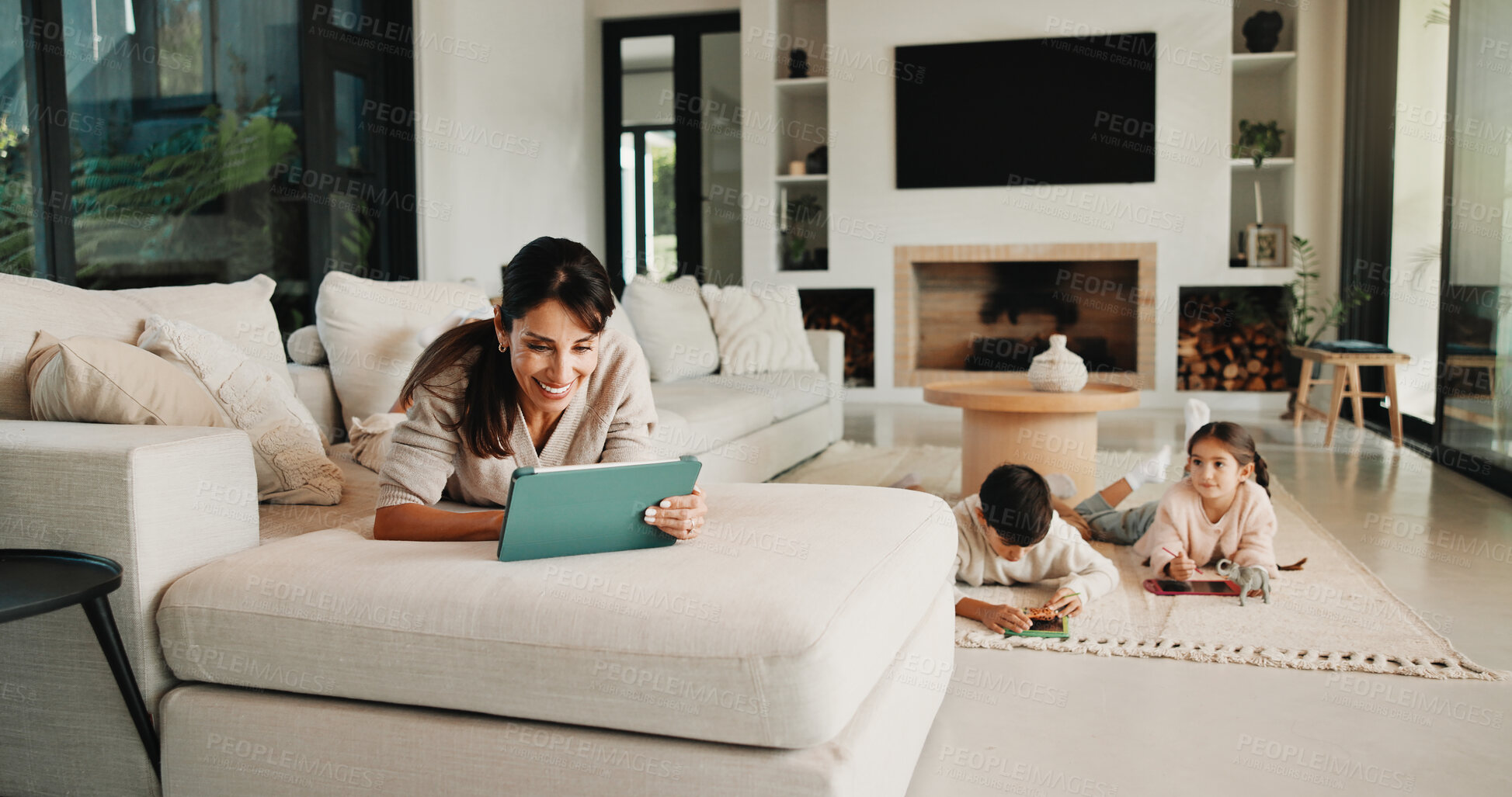Buy stock photo Tablet, relax and mother on sofa in home for watching movie, film or series with subscription. Happy, children and mom on digital technology for streaming show on app in living room at house.