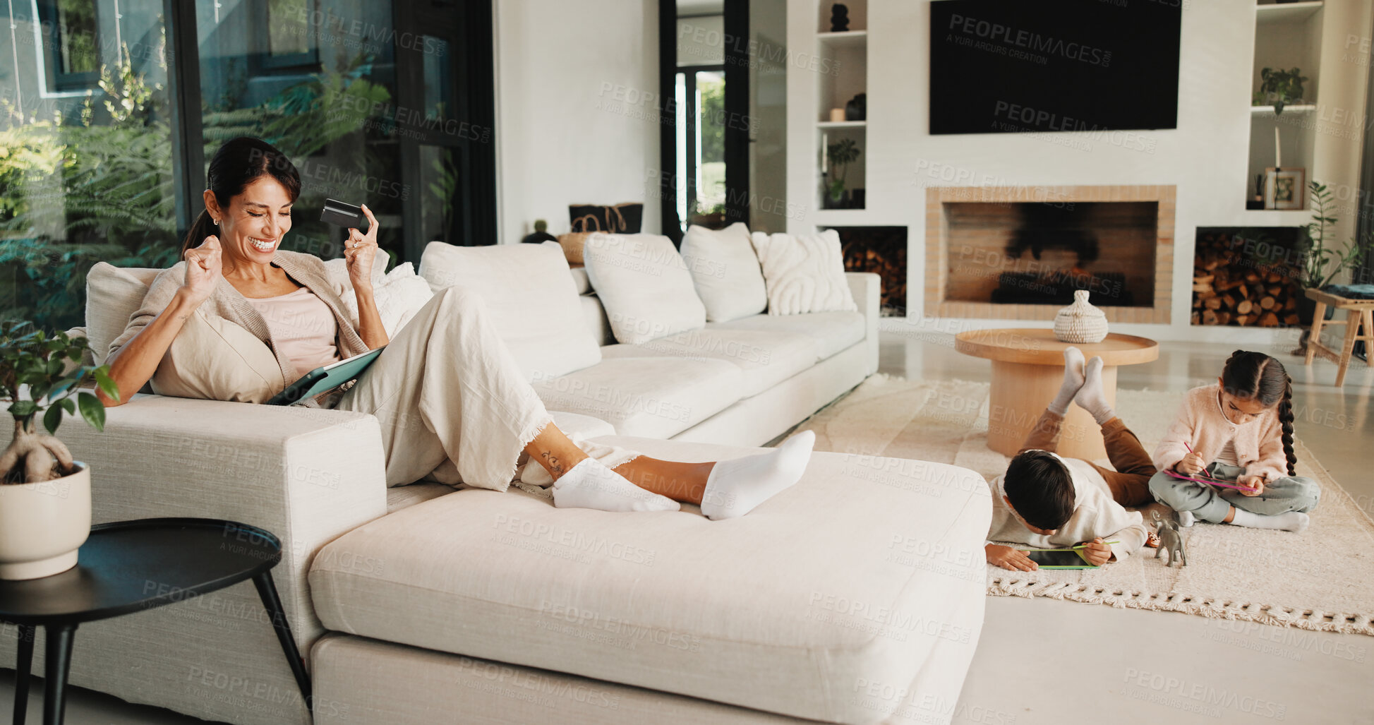 Buy stock photo Mother, children and credit card with tablet for online shopping sale, payment or savings in home. Kids, happy woman and fist pump on sofa with tech, digital banking or website for ecommerce discount