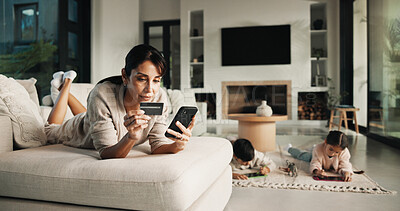 Buy stock photo Phone, credit card and mother in home for payment, digital banking and discount with children. Mobile, debit and woman in living room, financial purchase and online shopping with kids in family house
