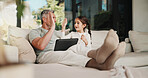 Father, child and high five in home with tablet, bonding or educational game for cognitive development. Family, dad and daughter learning on couch with tech, digital app and celebration for growth.