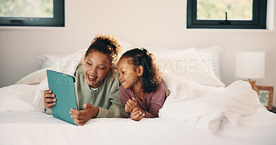 Buy stock photo Smile, streaming and tablet with children on bed in home together for bonding or social media browsing. Happy, love and relax with sister kids in bedroom of apartment for development or growth