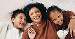 Relax, cuddle and mother with children in bed, support and affection for relationship development. Portrait, home and happy woman with girls for connection, bonding and teddy bear for family time