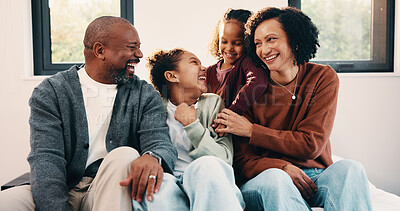 Buy stock photo Parents, play and laughing with kids in bedroom for fun, holiday break and bonding together. Smile, people and tickle children for excitement, weekend activity and parenthood with funny games in home