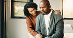 Couple, empathy and man with stress in bedroom, financial crisis and thinking of unemployment or sad. African woman, home and comfort with shoulder touch, mature people and guilt for job loss on bed