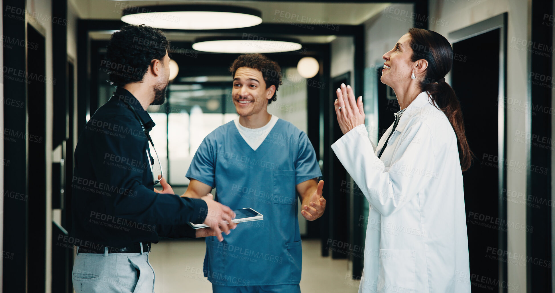 Buy stock photo Happy, doctors and nurses in hospital with tablet, medical research or relief for patient diagnosis. Healthcare people, collaboration or talk in clinic with tech, smile or good news for test results.