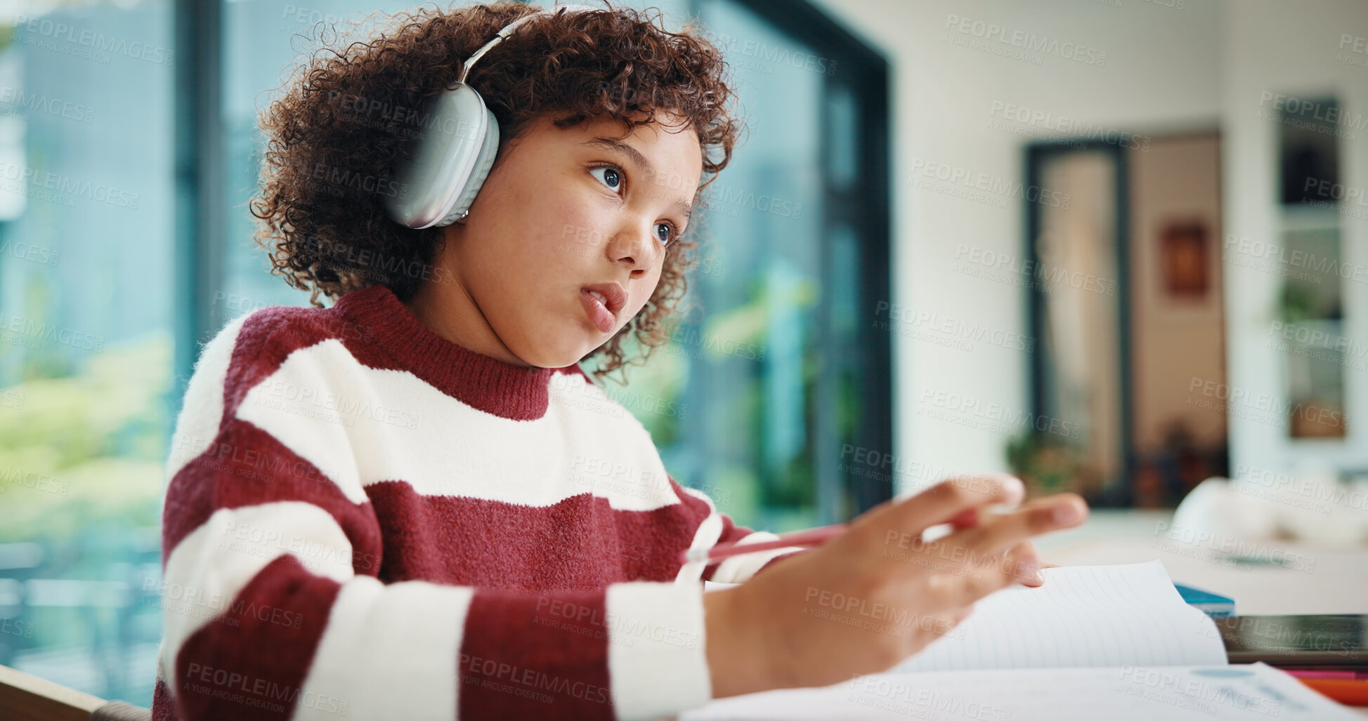 Buy stock photo Thinking, study and child with headphones in house for homework, knowledge or education. Count, kid and girl student with audio tech for listening to music, podcast or playlist with mathematics quiz.