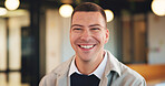 Man, happy and portrait in lobby at hotel, realtor or business trip for property assessment. Person, real estate agent and investor with pride, confident or smile for building inspection in Australia