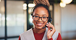 Consultant, portrait or black woman with headset in office for online advice or telecommunications. Female person, happy agent or smile with mic for virtual assistance, support or help in call center