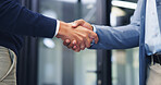 Business people, shaking hands and agreement at office, success or motivation at property development. Staff, handshake and partnership with broker, realtor and congratulations for deal at agency
