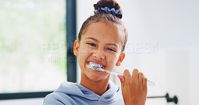 Buy stock photo Portrait, toothbrush and smile with kid in bathroom of home for morning routine or oral hygiene. Brushing teeth, cleaning and dental with girl child in apartment for health, prevention or wellness
