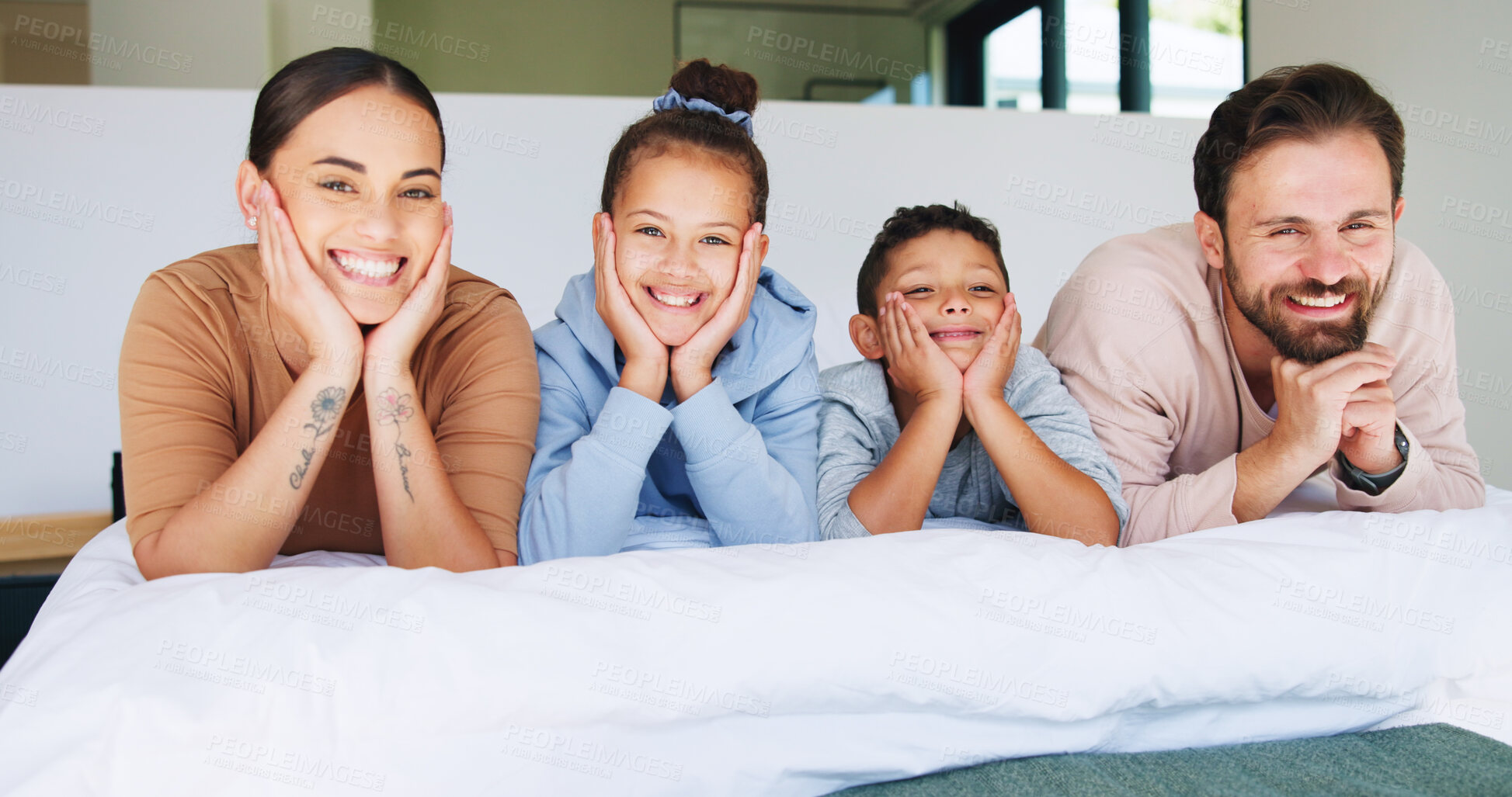 Buy stock photo Portrait, relax and smile with family in bedroom of home for bonding or weekend. Happy, love or relationship with children, father and mother on bed in apartment for safety, security or trust