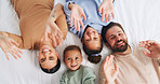Happy, portrait and relax with family on bed in home for bonding or weekend from above. Affection, love or morning with children, father and mother waving in apartment for safety, security or trust